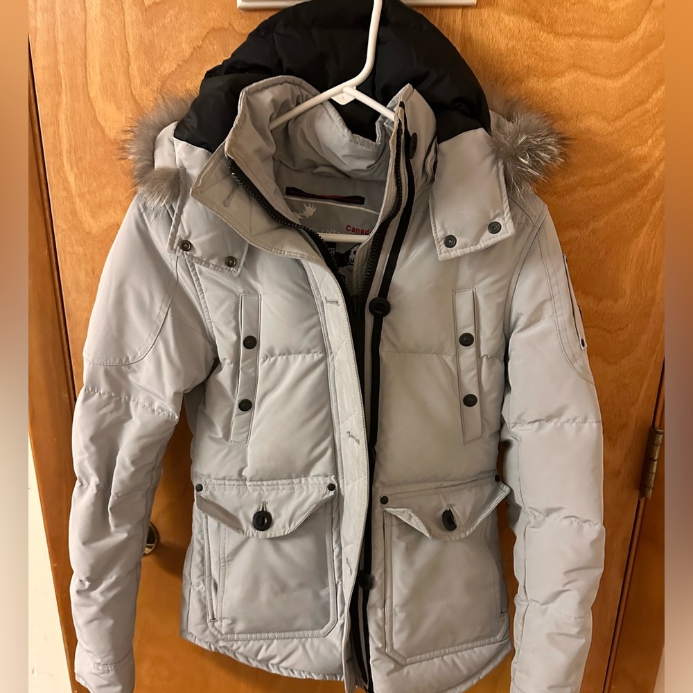 Moose knuckle coat one year old. Great condition. Very warm and flattering.